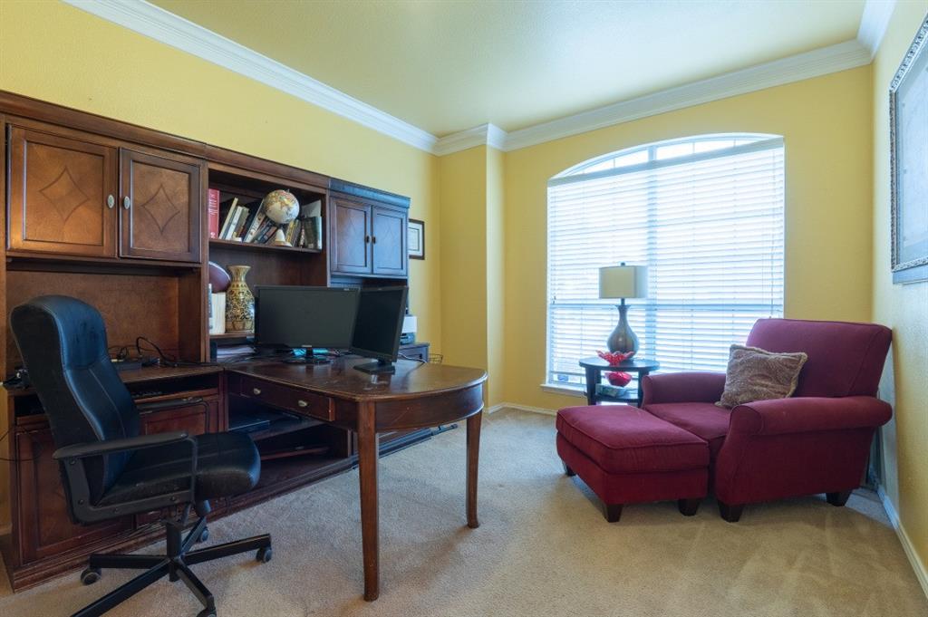 2248 Condor Street Grand Prairie, TX 75052 - Photo 14 of 25 a view of a livingroom with workspace and a couch