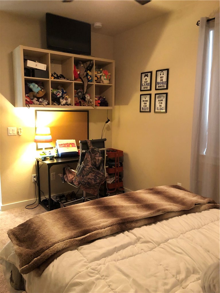 1303 Casey Street, Unit A Austin, TX 78745 - Photo 13 of 16 a room with storage and utility