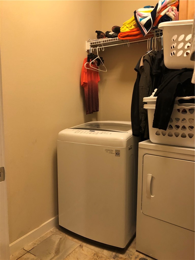 1303 Casey Street, Unit A Austin, TX 78745 - Photo 16 of 16 a utility room with dryer and washer