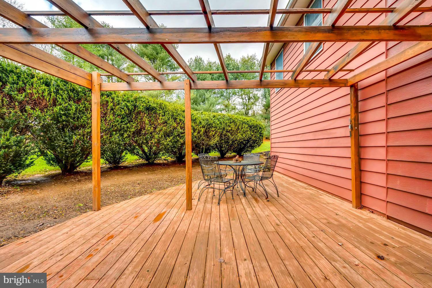 1034 Monkton Road Monkton, MD 21111 - Photo 28 of 30 a view of a patio with table and chairs