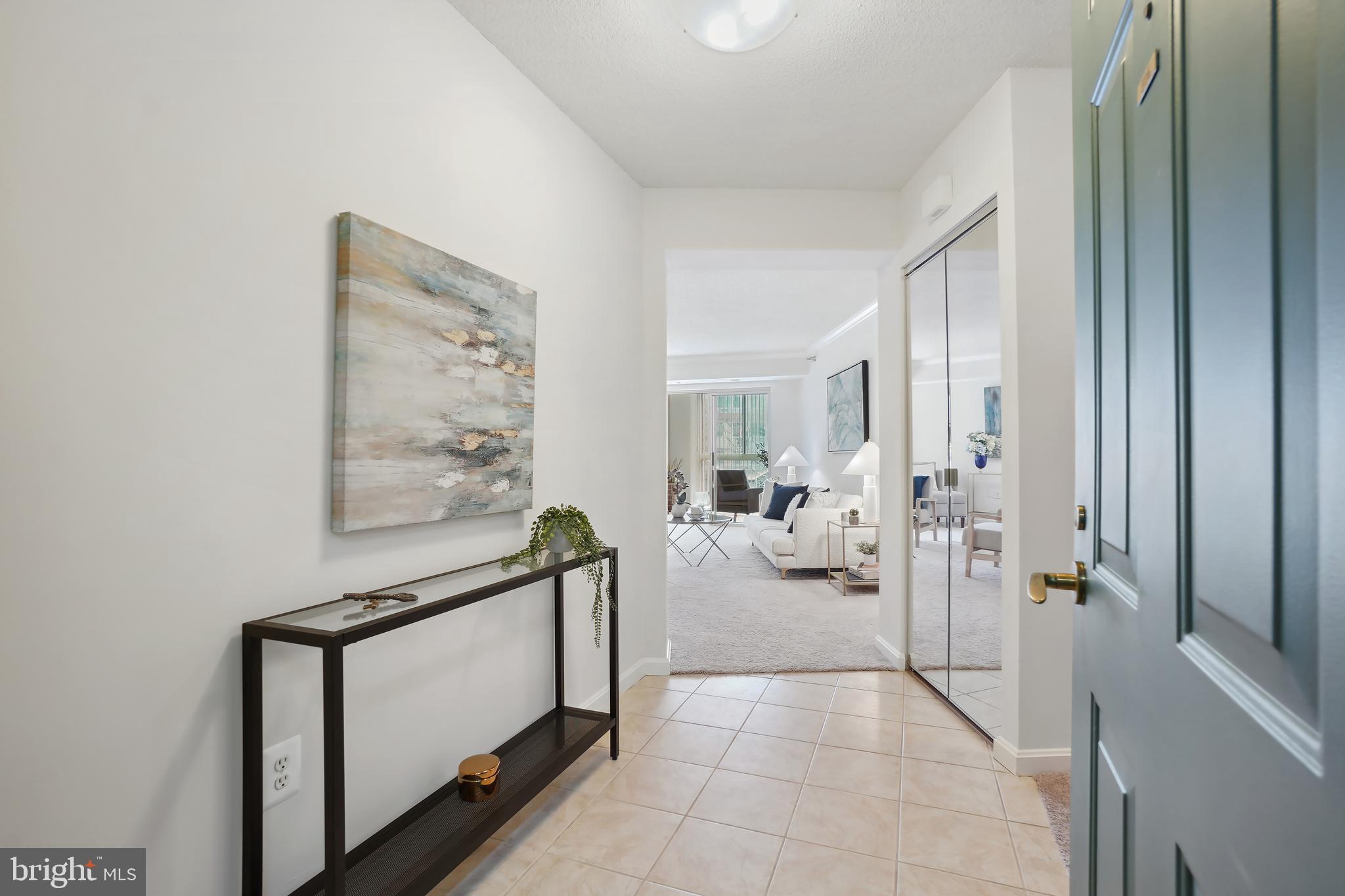 14801 Pennfield Circle, Unit 306 Silver Spring, MD 20906 - Photo 2 of 45 a living room with furniture