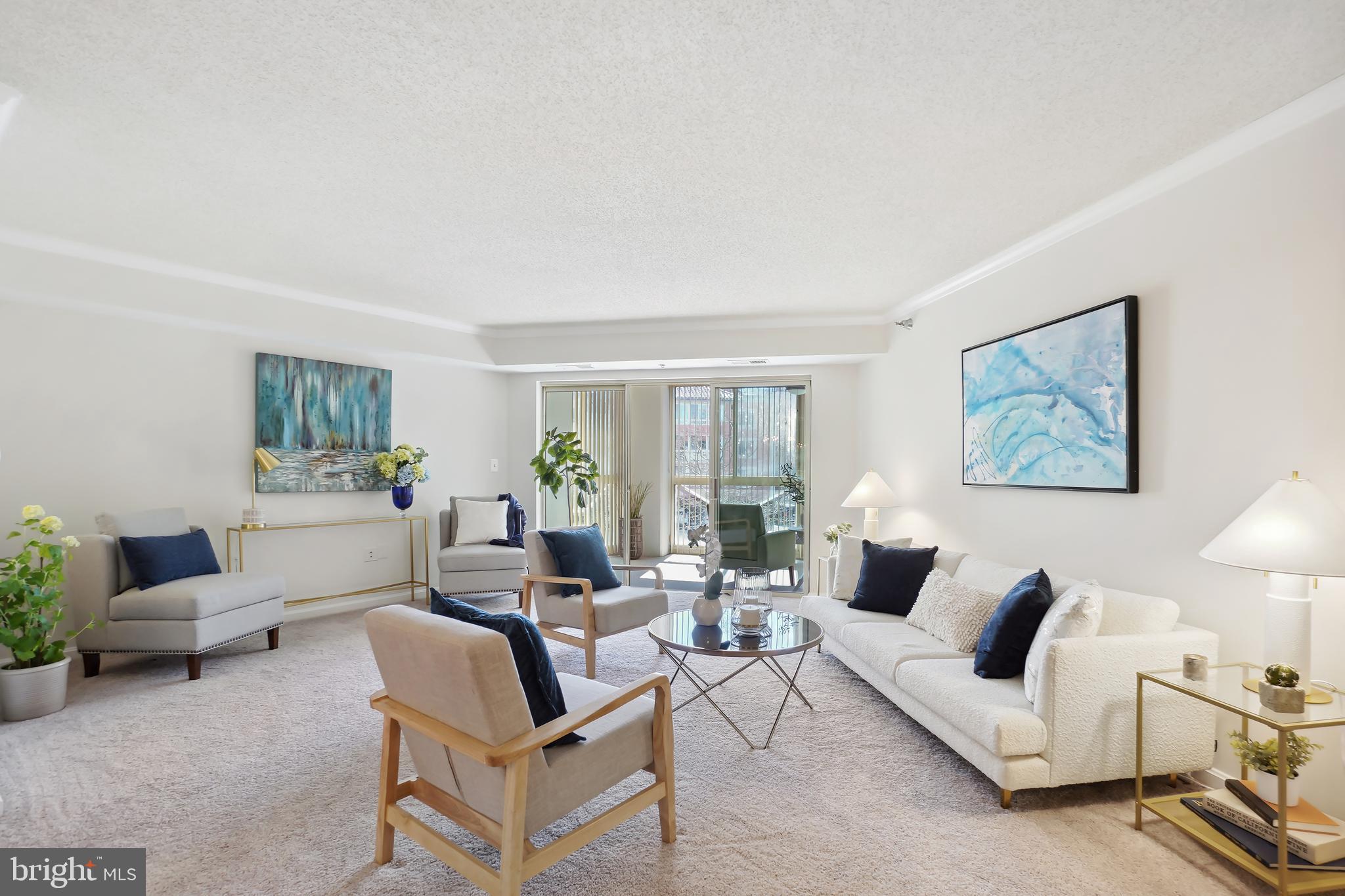 14801 Pennfield Circle, Unit 306 Silver Spring, MD 20906 - Photo 3 of 45 a living room with furniture and a large window