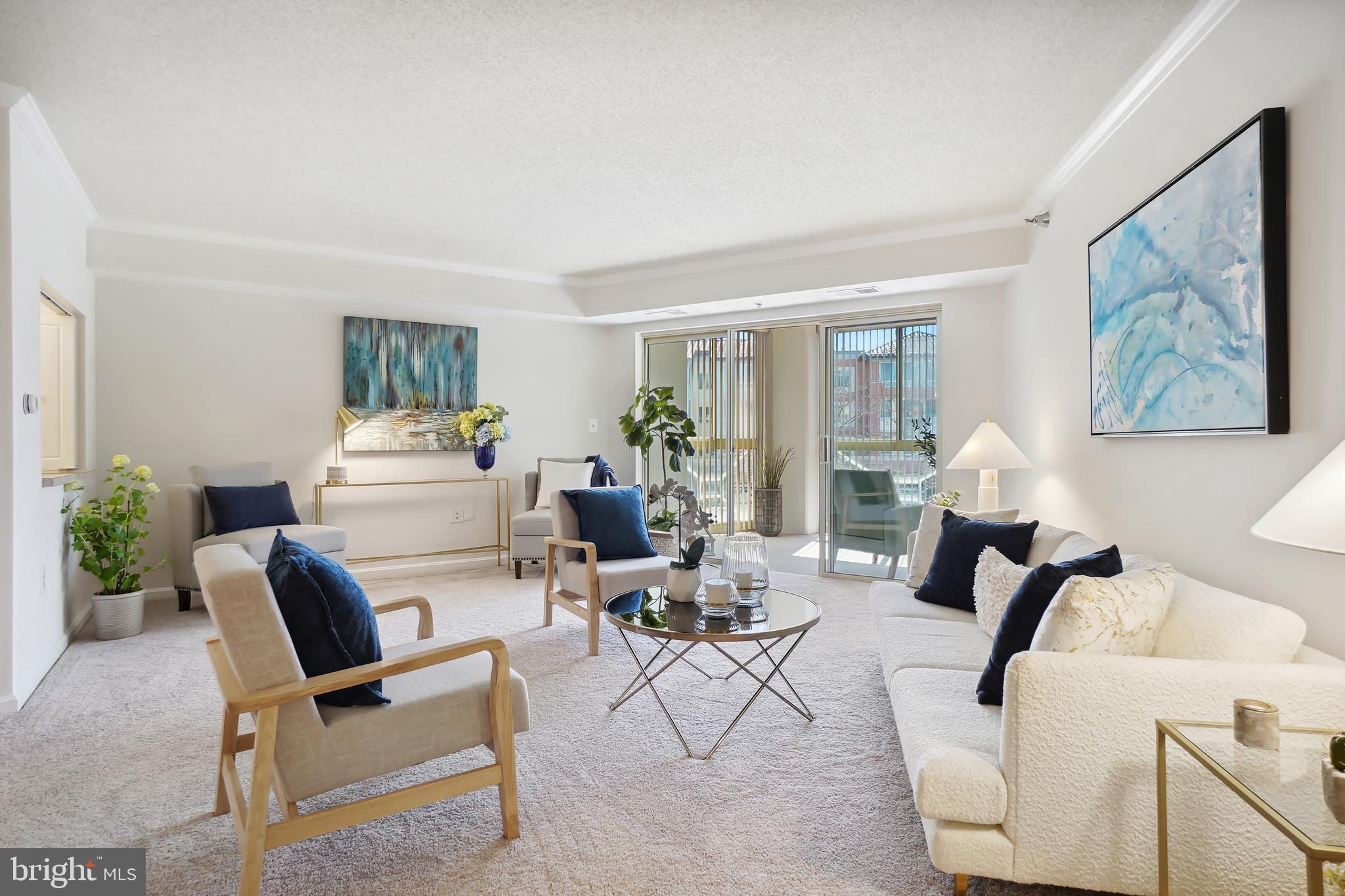 14801 Pennfield Circle, Unit 306 Silver Spring, MD 20906 - Photo 4 of 45 a living room with furniture and a window