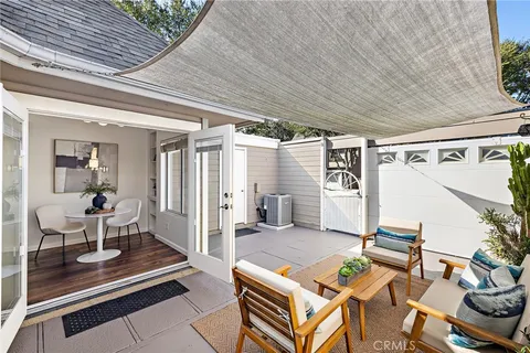 a outdoor space with lots of furniture and garden