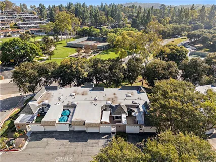 a view of multiple houses with yard