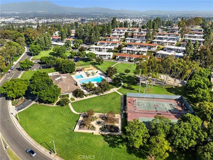 an aerial view of a house with a garden