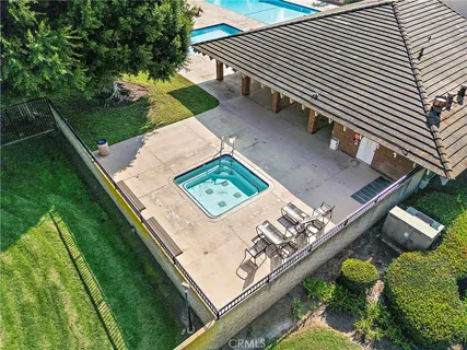 a view of a yard with an outdoor seating