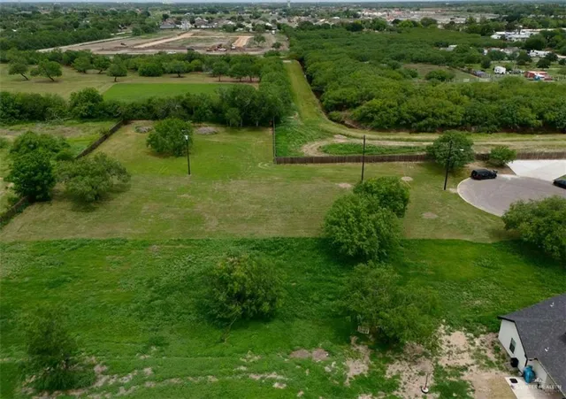 a view of a lake with a yard