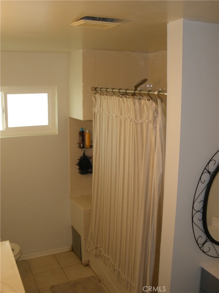39036 Sage Road Lucerne Valley, CA 92356 - Photo 11 of 41 a bathroom with a shower and a tub