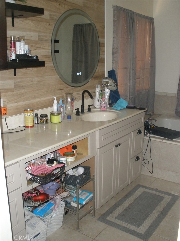 39036 Sage Road Lucerne Valley, CA 92356 - Photo 13 of 41 a bathroom with a sink and a mirror