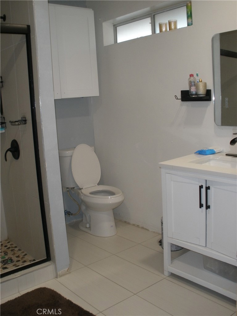 39036 Sage Road Lucerne Valley, CA 92356 - Photo 34 of 41 a white toilet sitting next to a sink