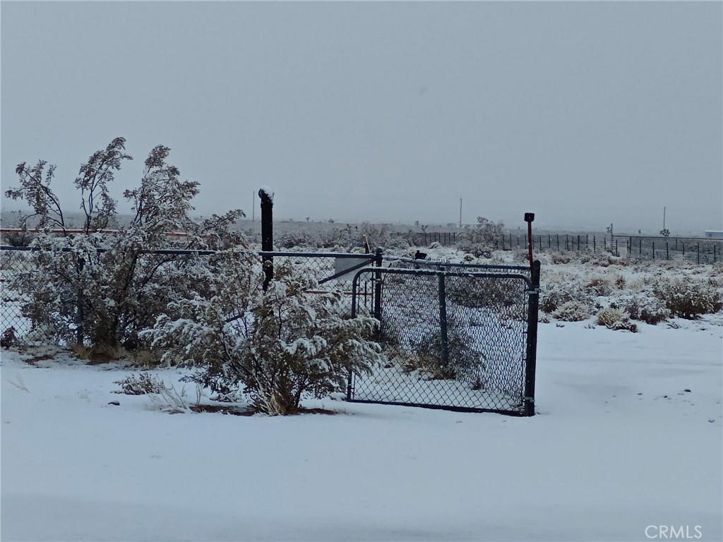 39036 Sage Road Lucerne Valley, CA 92356 - Photo 41 of 41 a view of a terrace with wooden fence