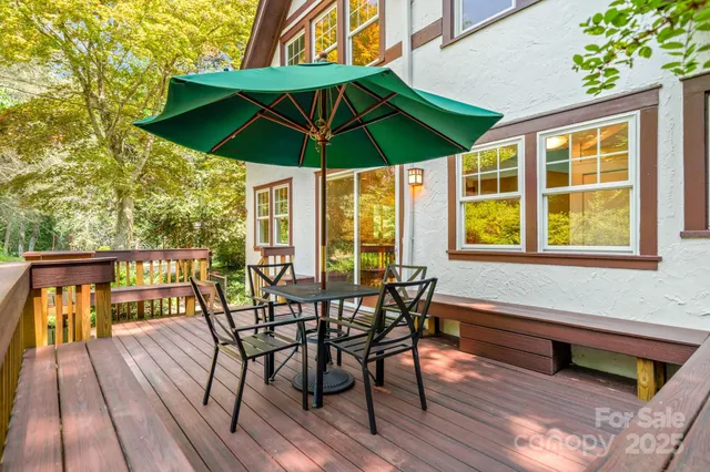 a view of balcony with outdoor seating and wooden floor