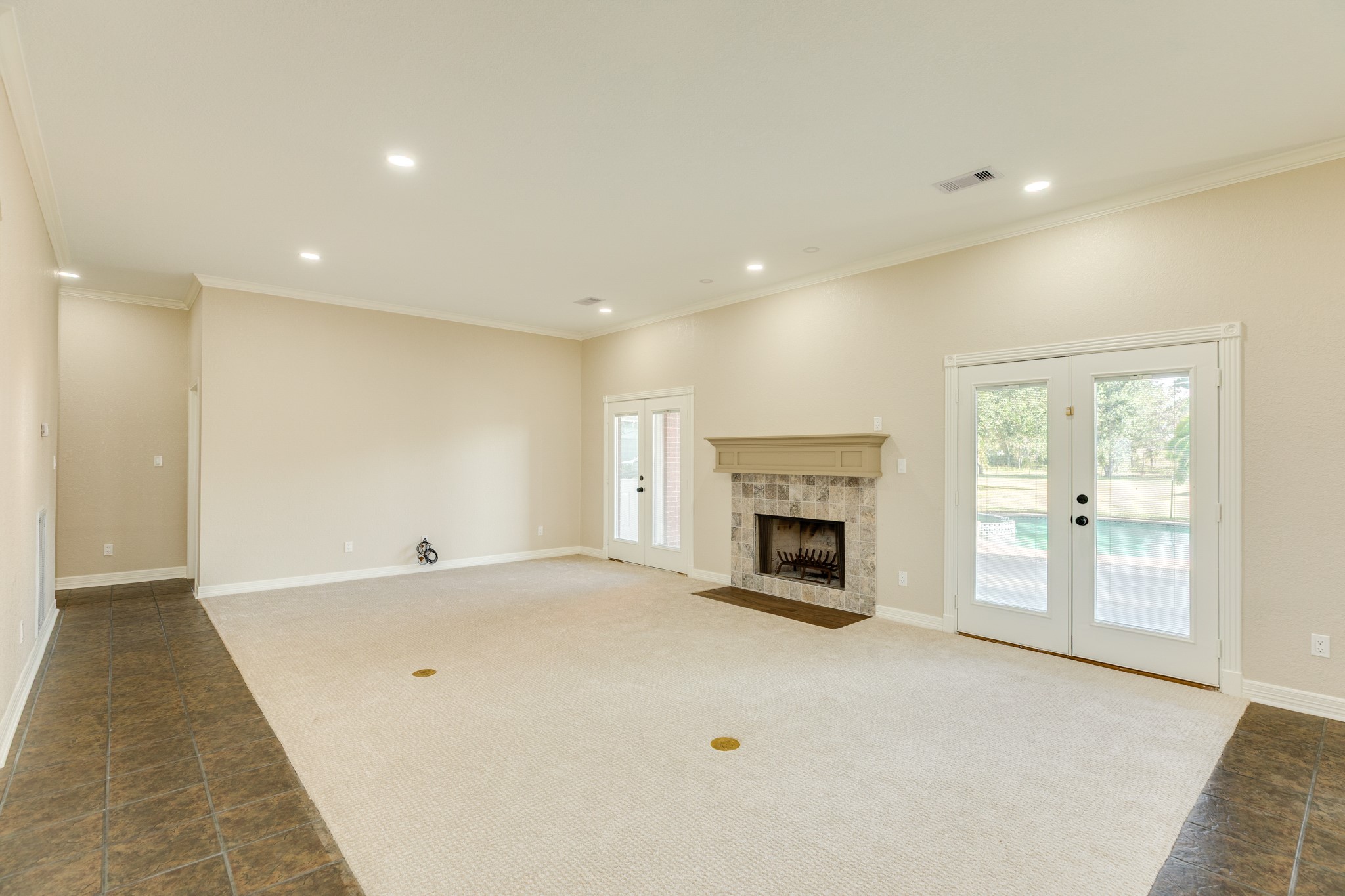 310 County Road 47 Angleton, TX 77515 - Photo 22 of 50 a view of an empty room with a fireplace