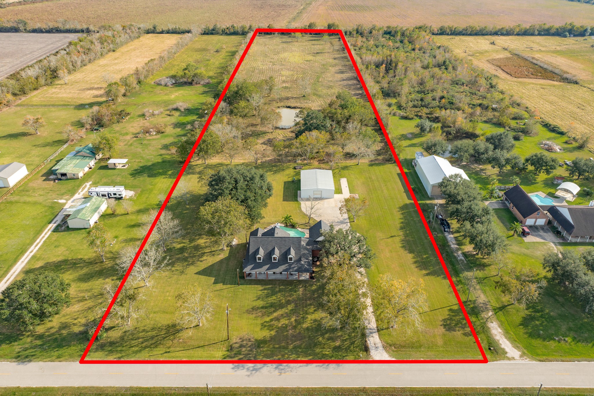 310 County Road 47 Angleton, TX 77515 - Photo 3 of 50 a view of an outdoor space