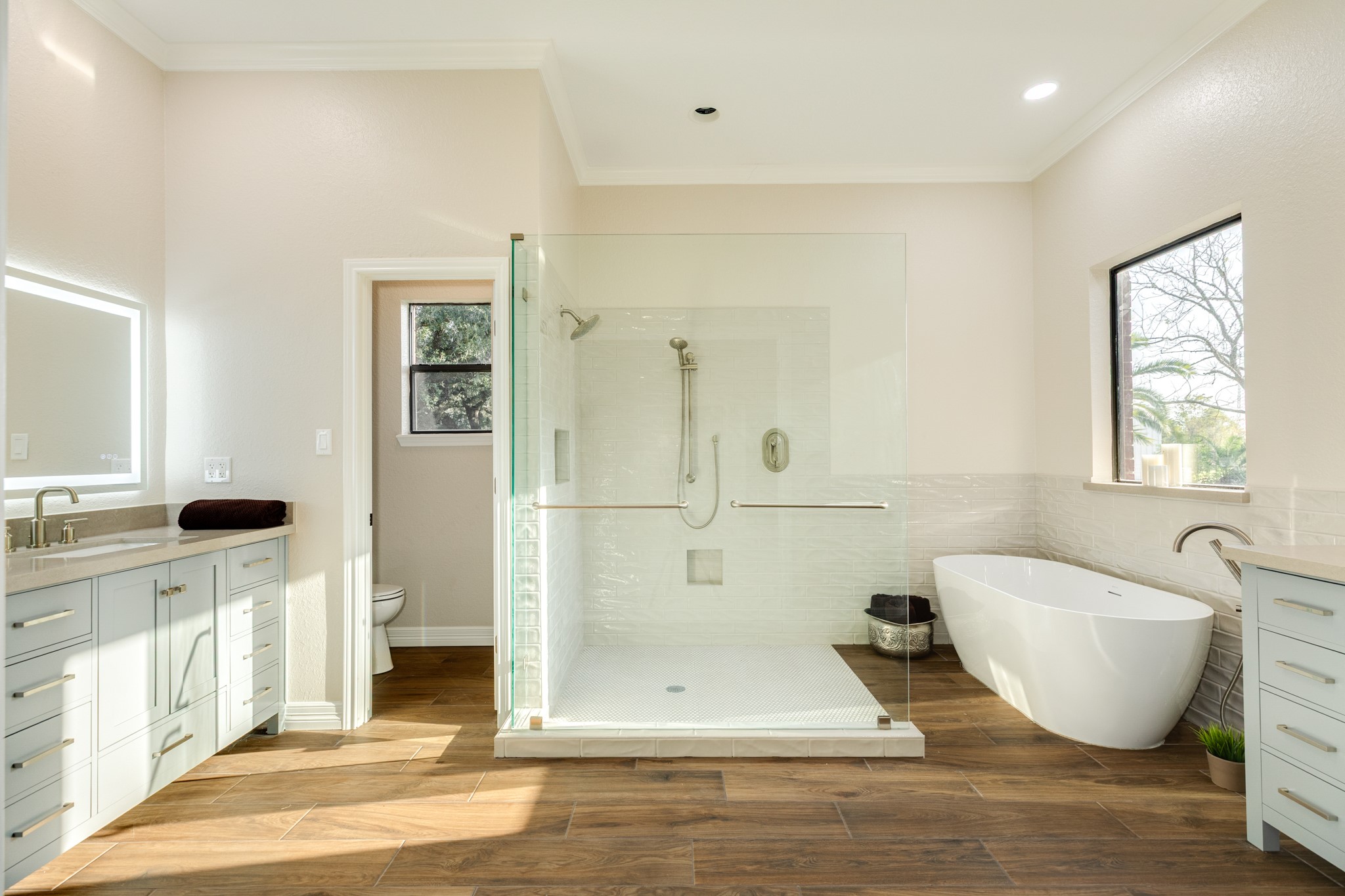 310 County Road 47 Angleton, TX 77515 - Photo 35 of 50 a bathroom with a bathtub and a shower