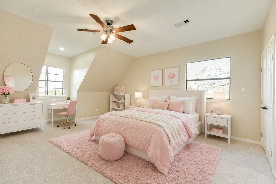 310 County Road 47 Angleton, TX 77515 - Photo 44 of 49 a bedroom with a bed and a large window