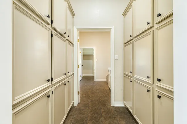 a view of an empty walk in closet