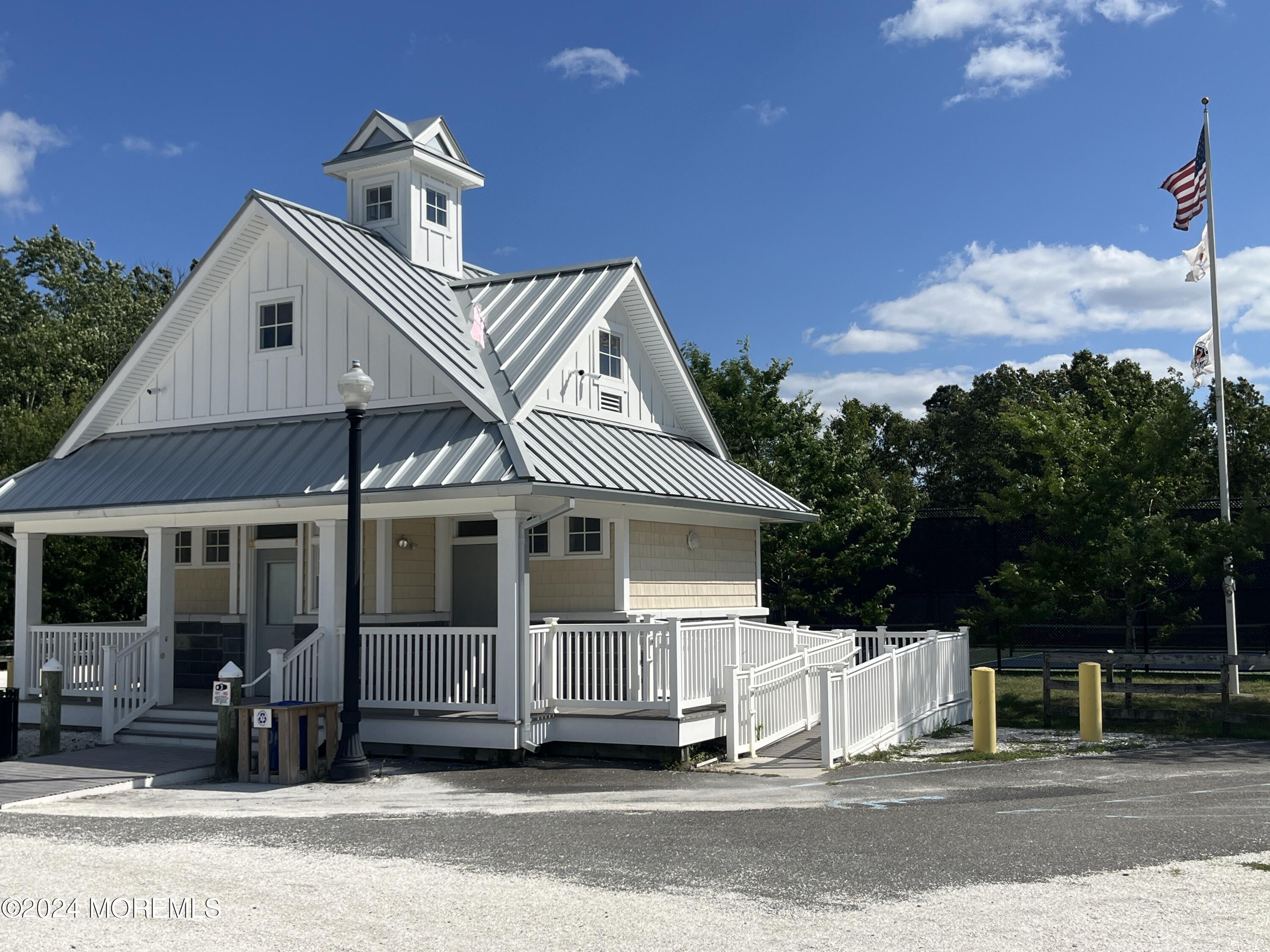 50 Dock Avenue Waretown, NJ 08758 - Photo 4 of 19 a view of a white house
