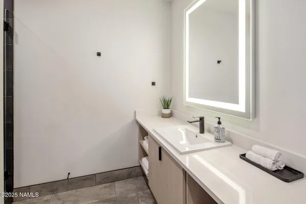 a view of small space with empty racks on the wall