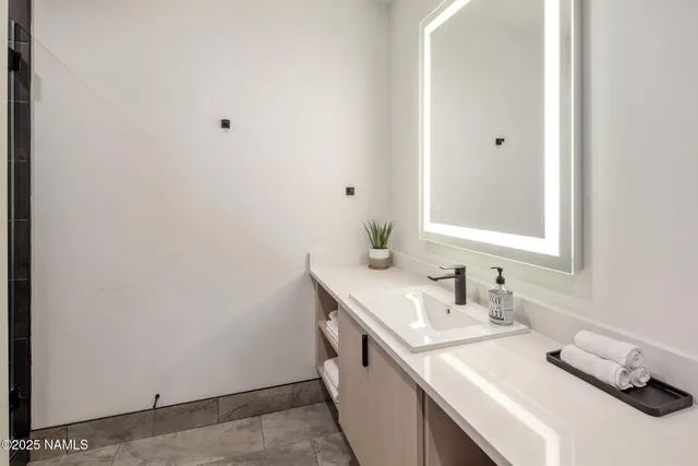 a view of small space with empty racks on the wall