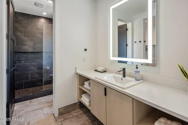 a view of a swimming pool with lounge chair