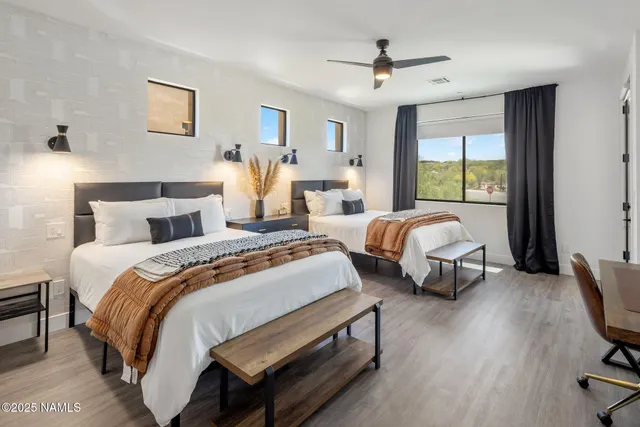 an aerial view of residential houses with outdoor space