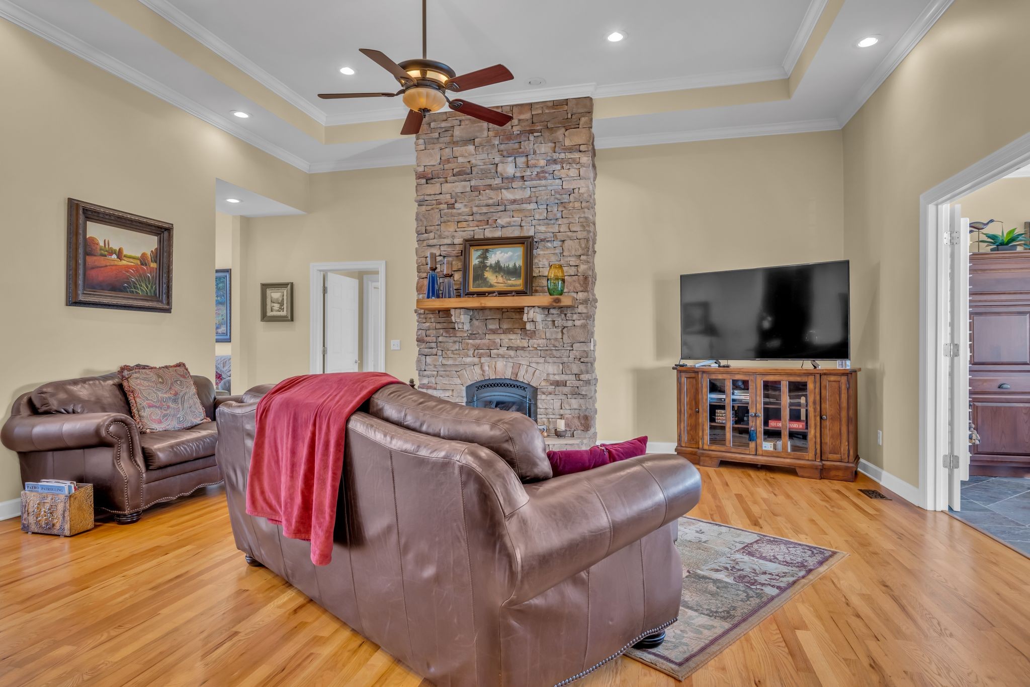 1270 Meeks Cemetery Road Burns, TN 37029 - Photo 12 of 44 a living room with furniture and a flat screen tv