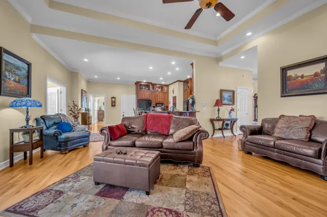 a view of kitchen with furniture and wooden floor