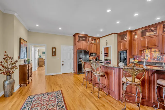 a bathroom with a sink vanity and a mirror