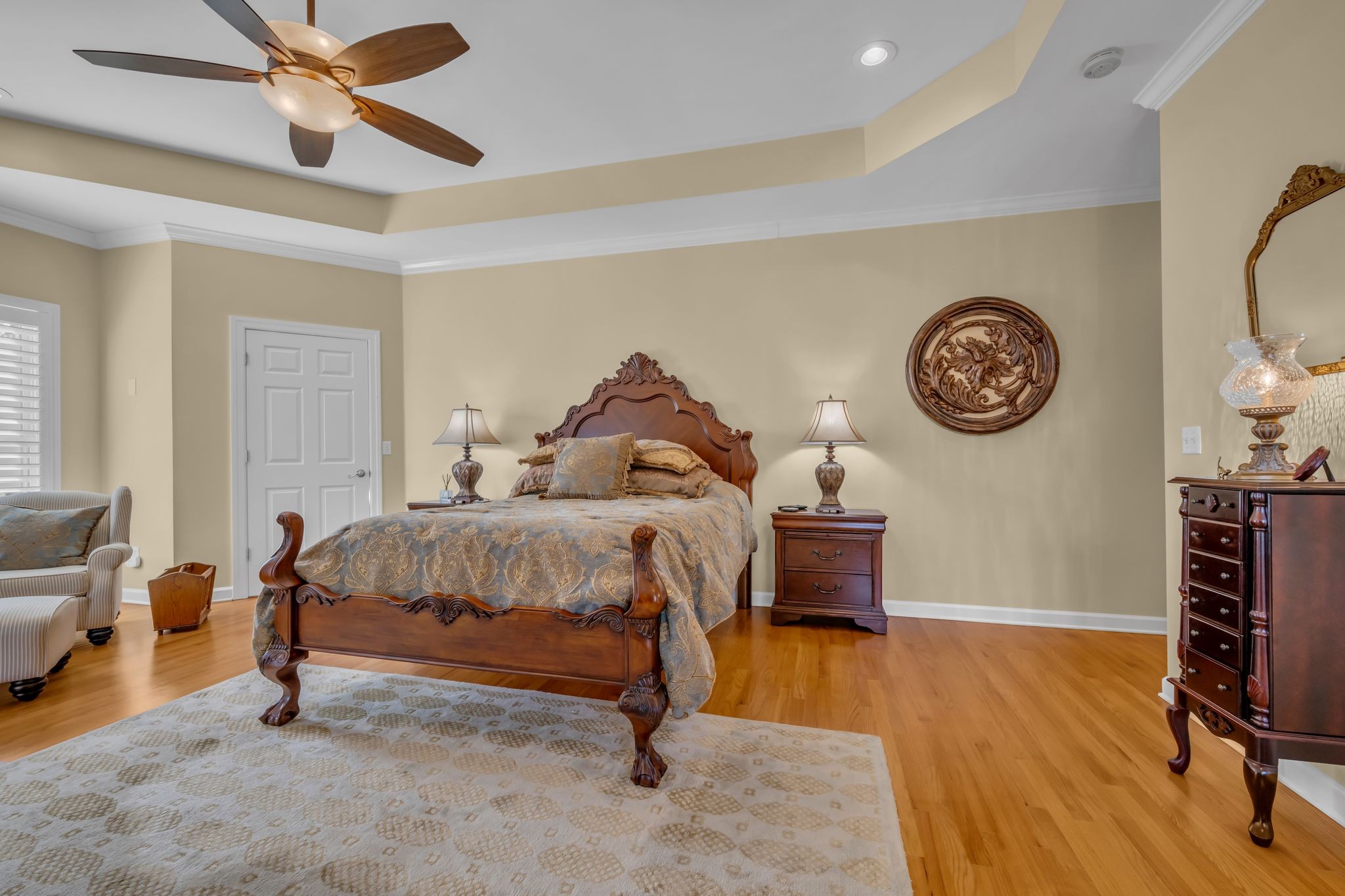 1270 Meeks Cemetery Road Burns, TN 37029 - Photo 22 of 44 a bedroom with a bed and a chandelier