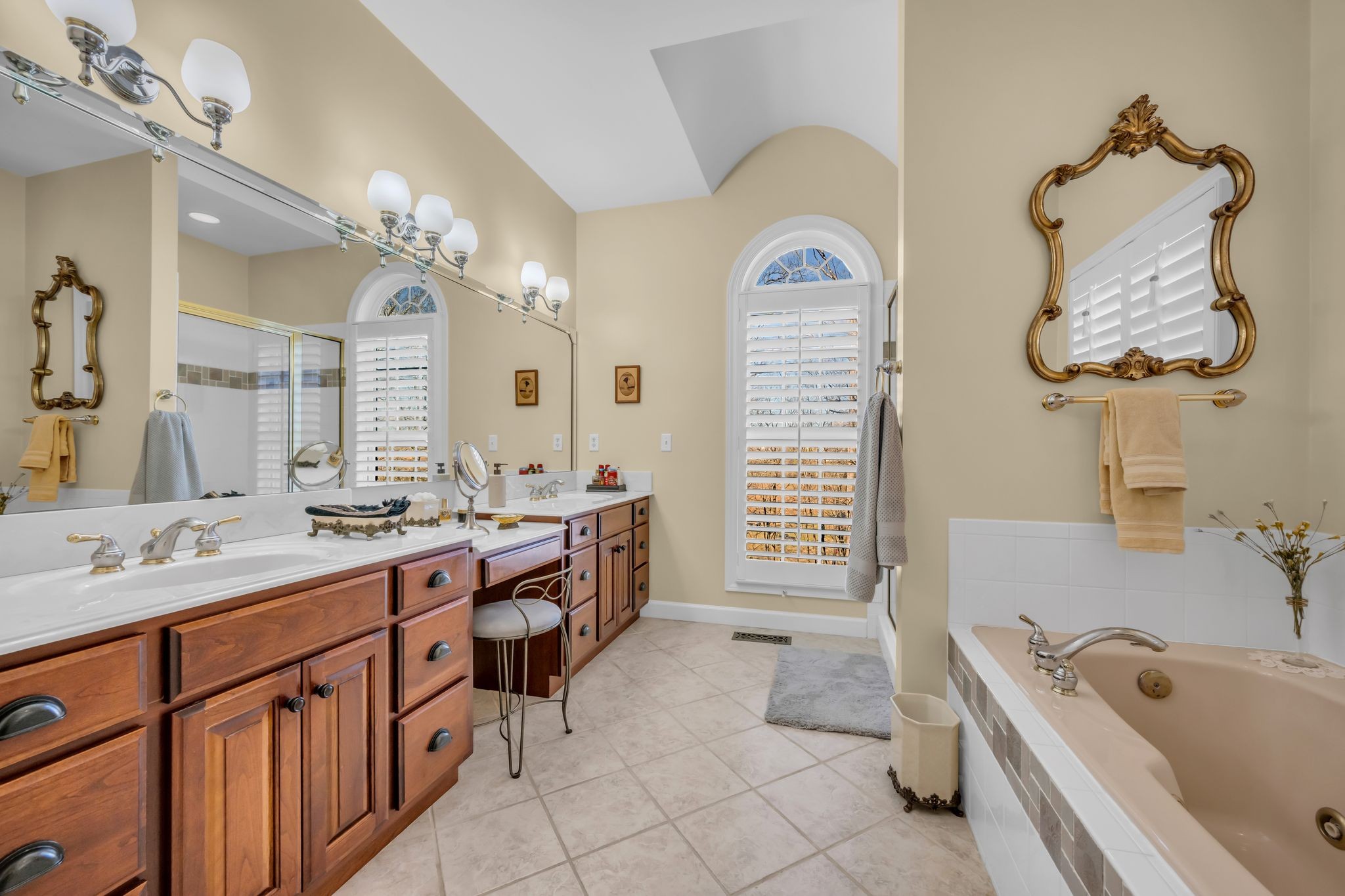 1270 Meeks Cemetery Road Burns, TN 37029 - Photo 24 of 44 a bathroom with a tub sink and mirror