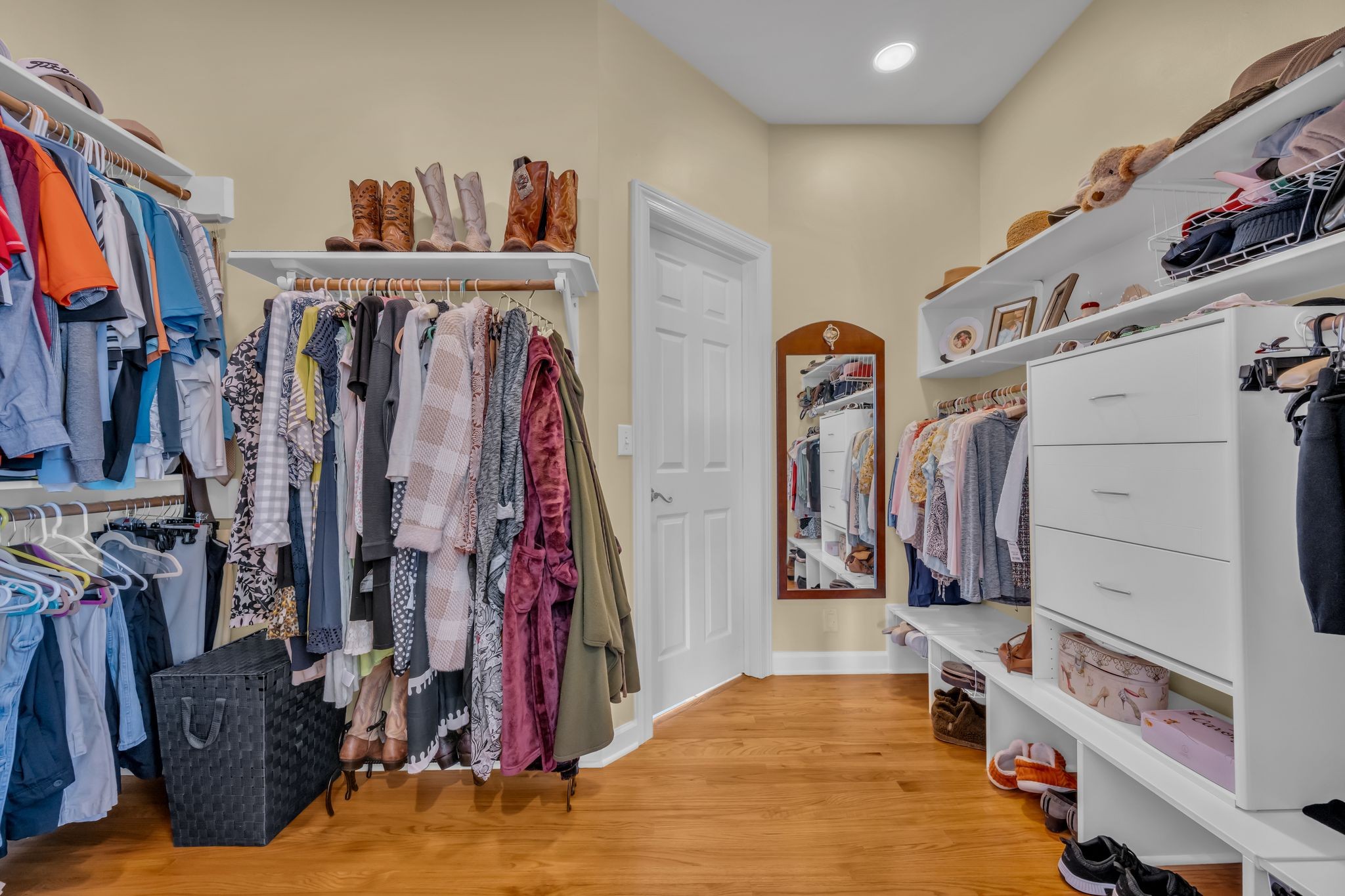 1270 Meeks Cemetery Road Burns, TN 37029 - Photo 25 of 44 a view of walk in closet with clothes and shoes