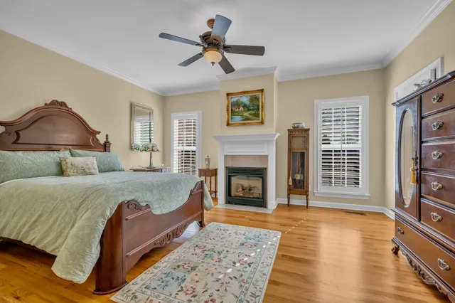 a large building with swimming pool in front of it