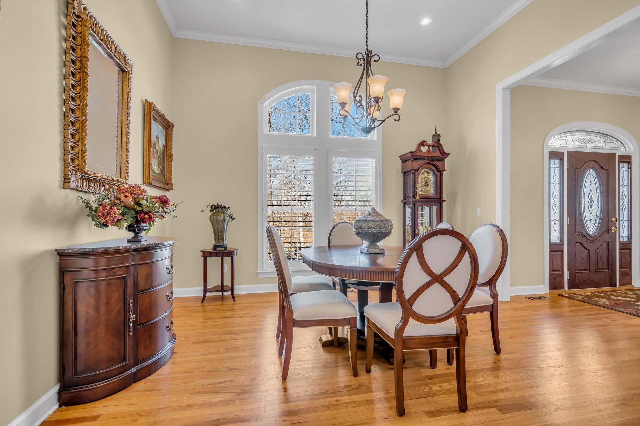 1270 Meeks Cemetery Road Burns, TN 37029 - Photo 9 of 44 a view of a dining room with furniture wooden floor and chandelier