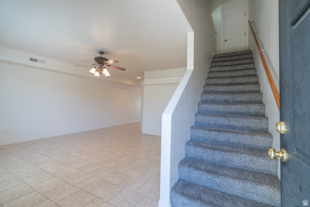 1735 West 540 North, Unit 1805 St. George, UT 84770 - Photo 6 of 64 Open concept living space featuring neutral tile flooring and a ceiling fan with integrated lighting