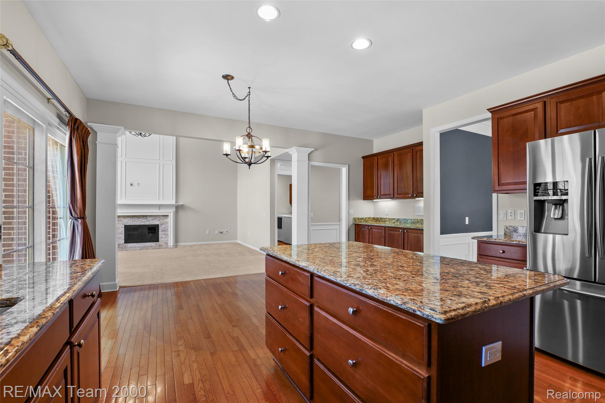 1248 Lasalle Road Canton, MI 48187 - Photo 34 of 67 Kitchen featuring rich wood-finish cabinetry, granite countertops, and stainless steel appliances