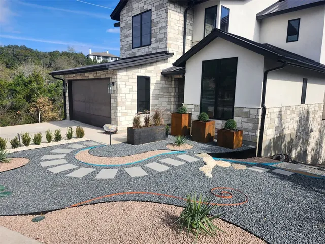 a view of a house with backyard tub and couches