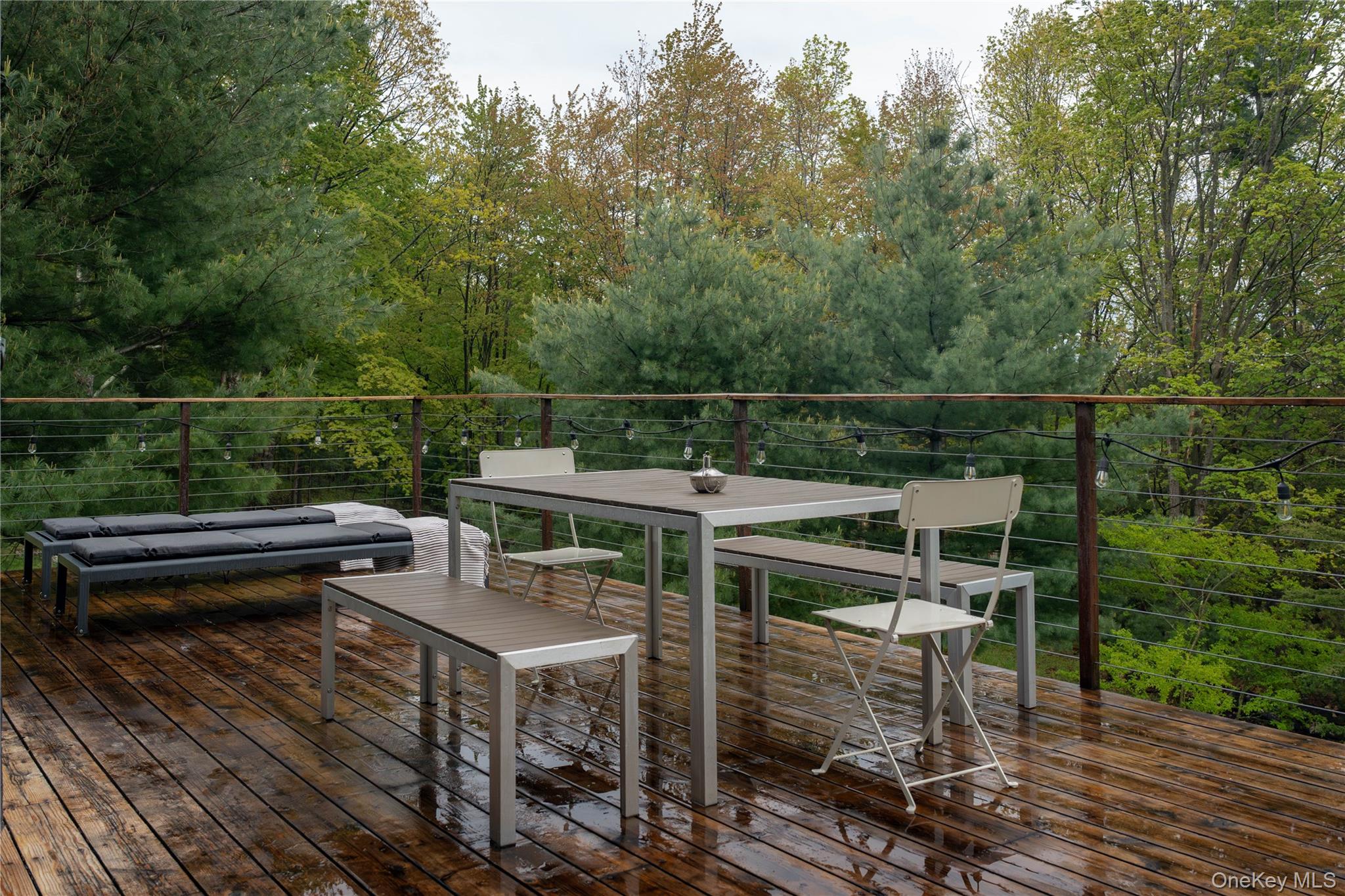22 Mc Guffey Road Kerhonkson, NY 12446 - Photo 3 of 24 a view of a roof deck with couches and wooden floor