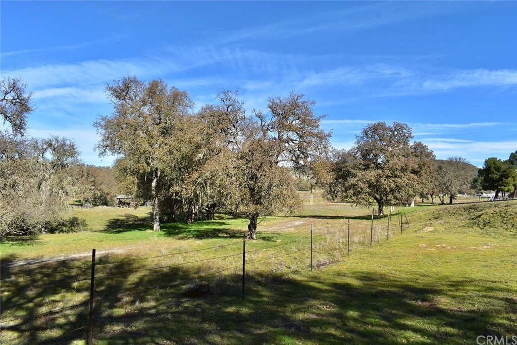1515 Gateway Drive Paso Robles, CA 93446 - Photo 11 of 24 a view of a lake with houses in the background