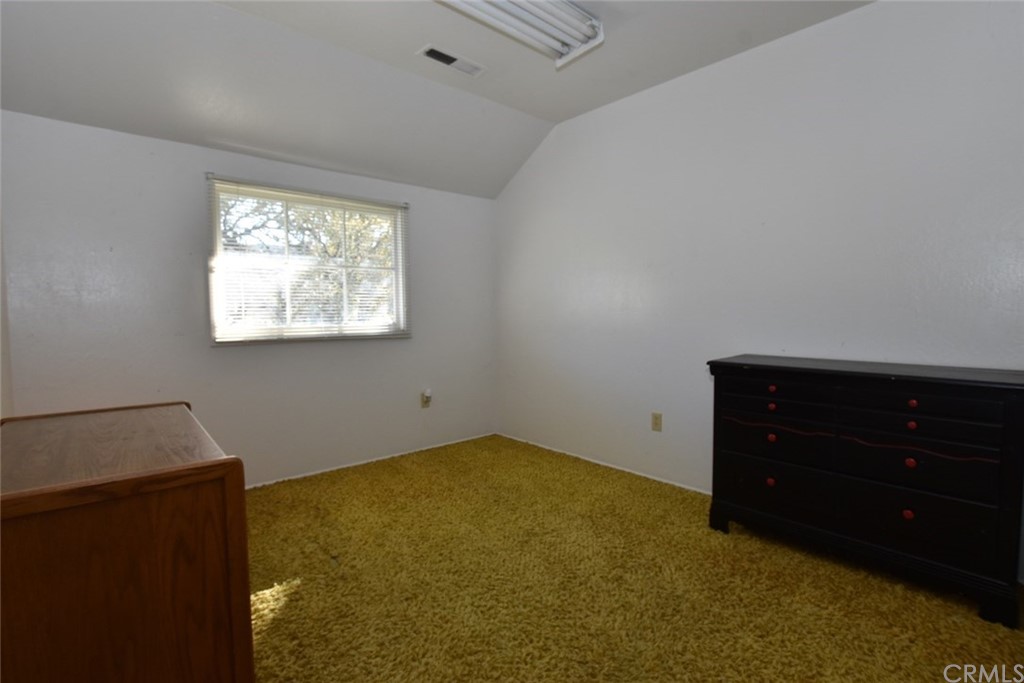 1515 Gateway Drive Paso Robles, CA 93446 - Photo 14 of 24 an empty room with a window and dresser