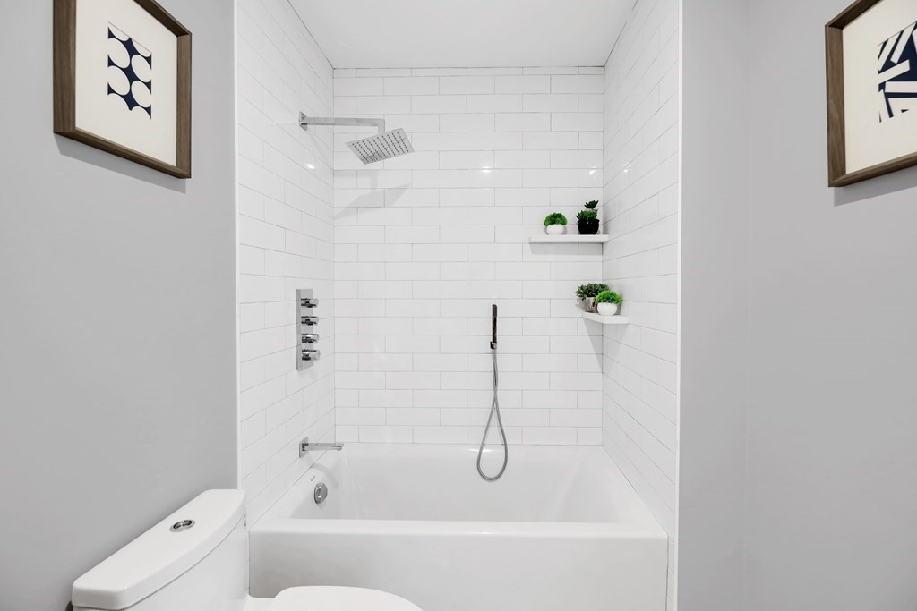 480 West Broadway, Unit 103 Boston, MA 02127 - Photo 15 of 19 a bathroom with a bathtub