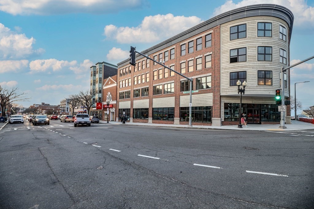 480 West Broadway, Unit 103 Boston, MA 02127 - Photo 18 of 19 a front view of a building with a street
