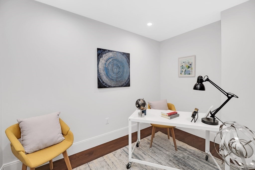 480 West Broadway, Unit 103 Boston, MA 02127 - Photo 8 of 19 a view of a workspace with furniture