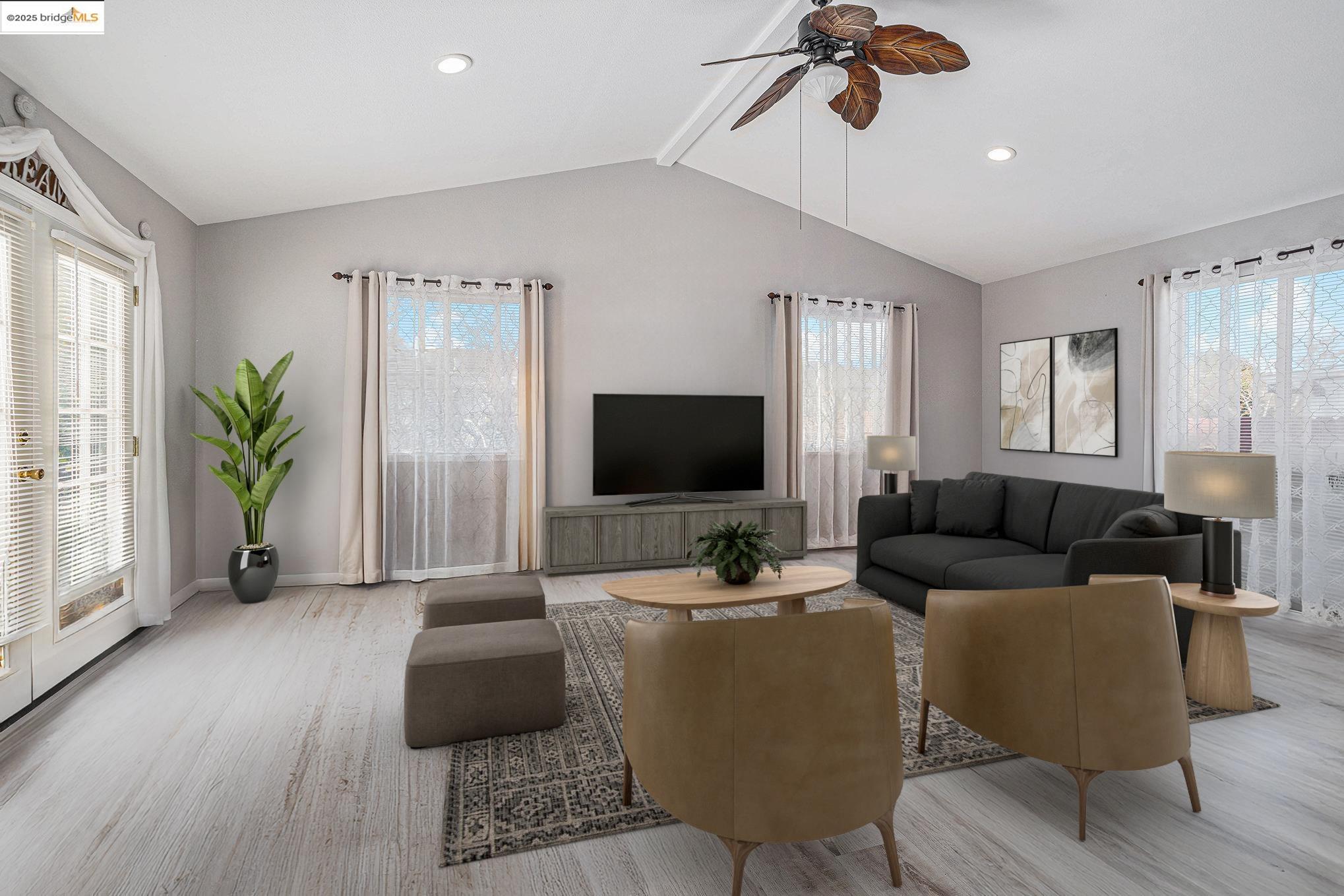 290 Benjamin Avenue Pittsburg, CA 94565 - Photo 1 of 1 a living room with furniture and a flat screen tv
