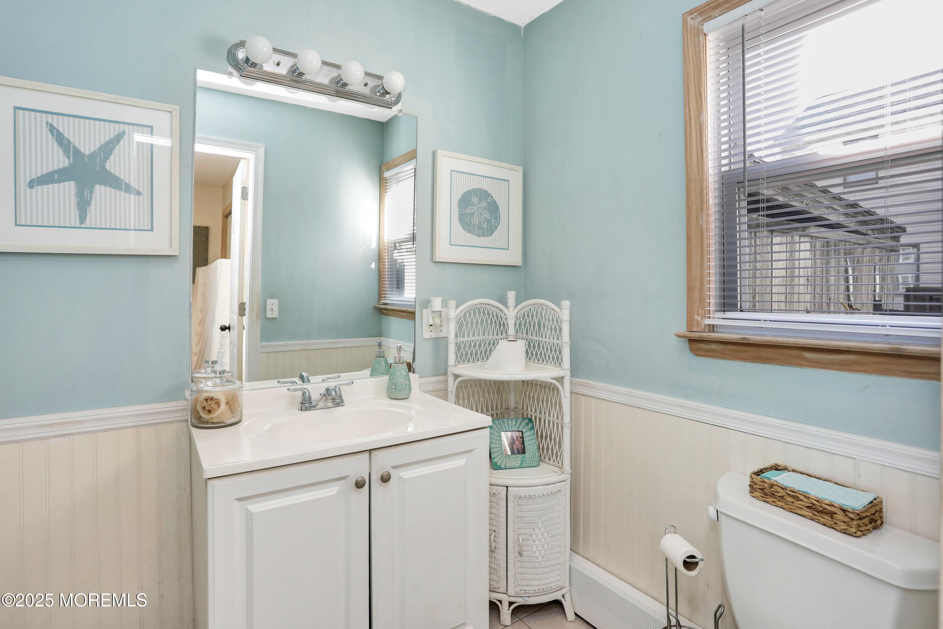 313 Shuster Avenue Seaside Heights, NJ 08751 - Photo 12 of 34 a utility room with a sink dryer and washer