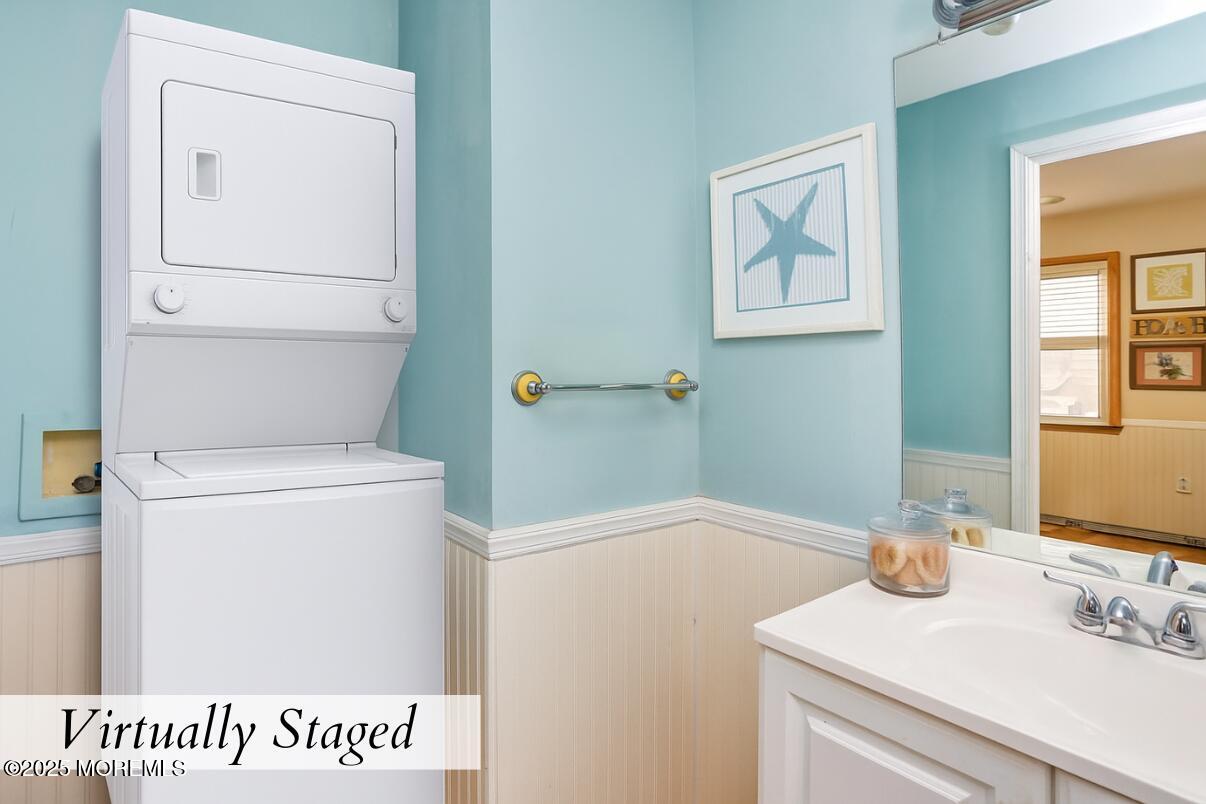 313 Shuster Avenue Seaside Heights, NJ 08751 - Photo 14 of 34 a bathroom with a sink and a toilet