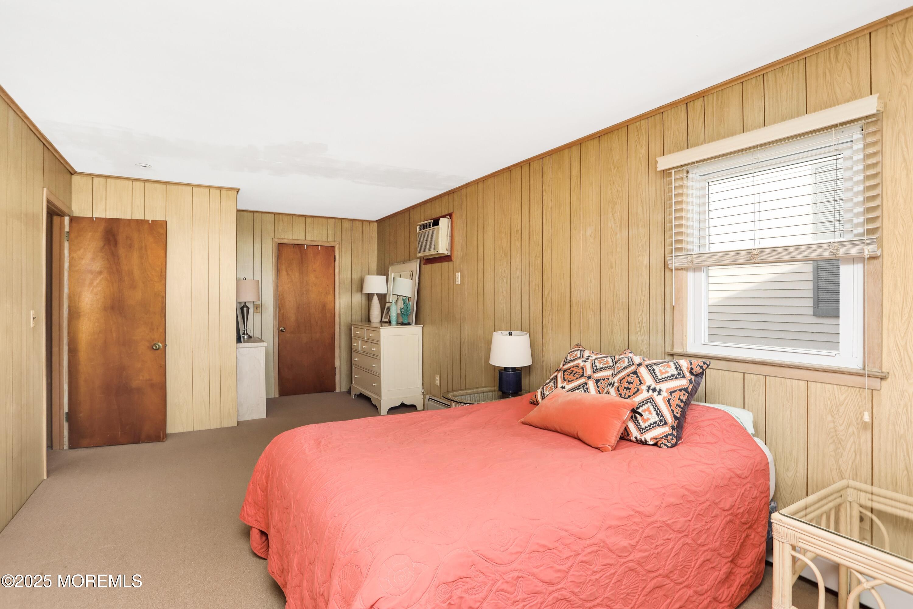 313 Shuster Avenue Seaside Heights, NJ 08751 - Photo 15 of 34 a bedroom with a bed and a window