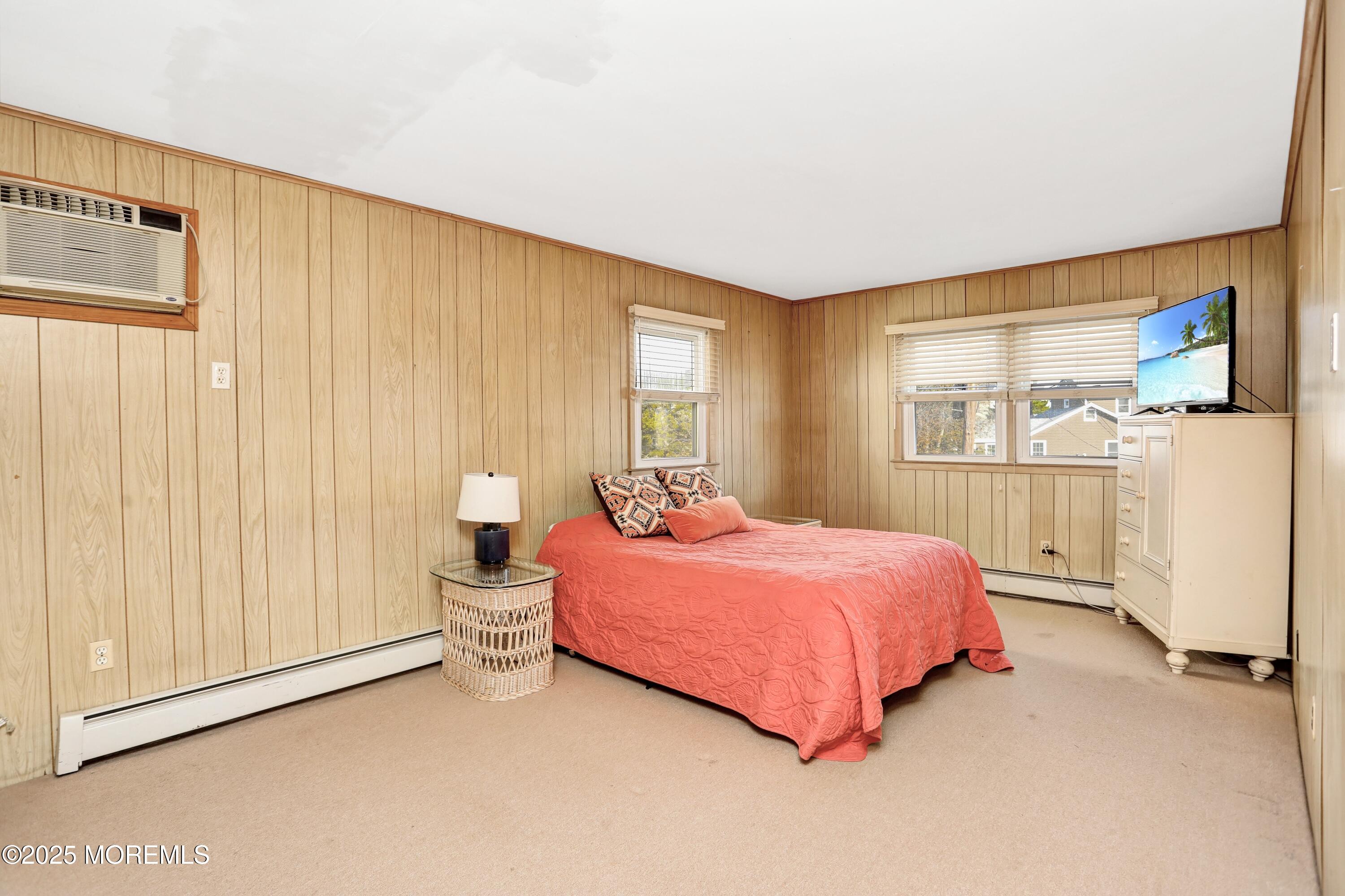 313 Shuster Avenue Seaside Heights, NJ 08751 - Photo 17 of 34 a bedroom with a bed and a window