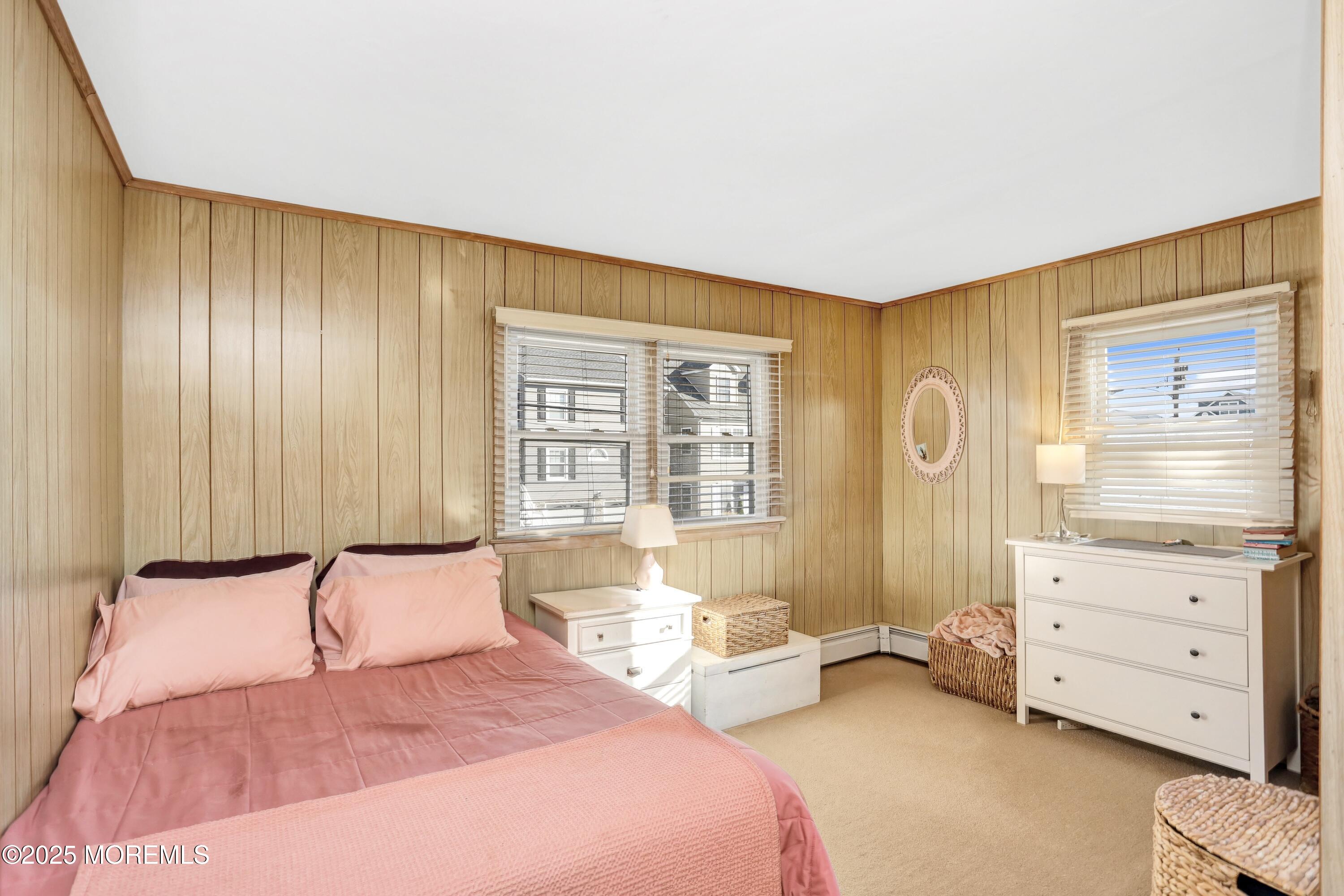 313 Shuster Avenue Seaside Heights, NJ 08751 - Photo 20 of 34 a bedroom with a bed and a dresser